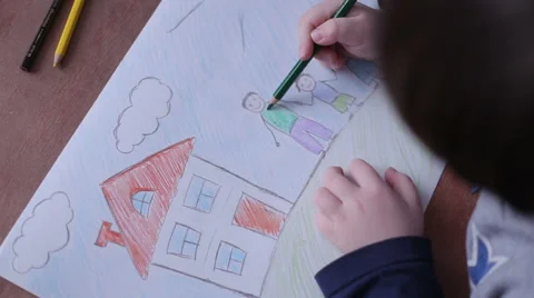 Child paints a figure Stock Footage 59190080