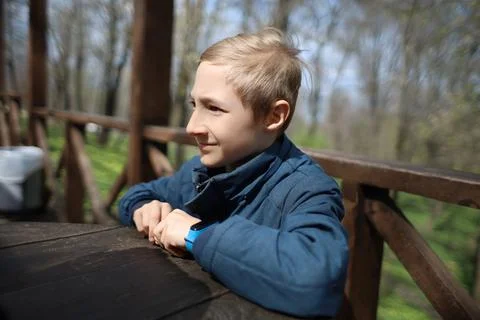 A child in the park in the spring Fotos Stock