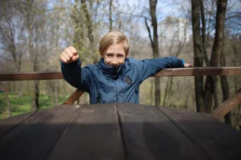 A child in the park in the spring Stock Photos
