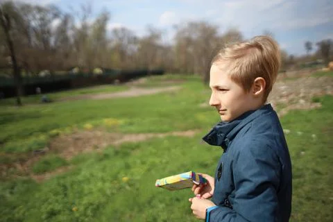 A child in the park in the spring Stock Photos