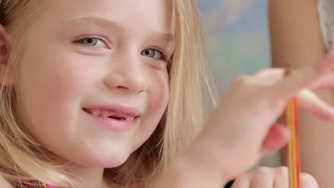 A child with a pencil in his hand Stock Footage 157883293