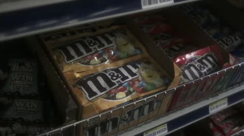 Child picking out candy in store Stock Footage 11520274