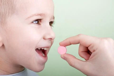 Child pill Stock Photos