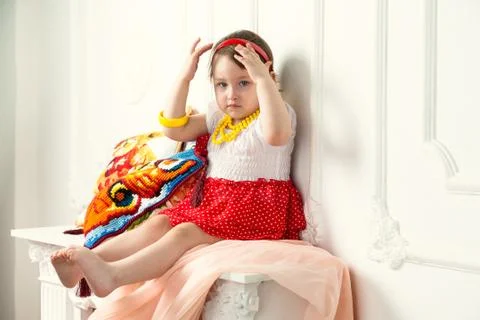 Child with pillows on the fire Stock Photos