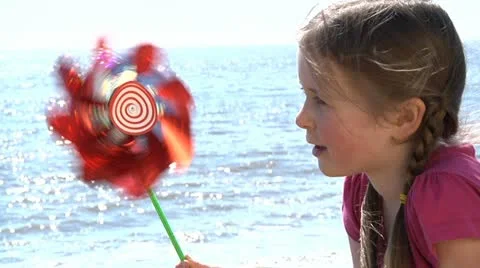 Child with pinwheel Stock Footage 22665169