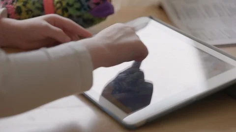 Child play games on tablet, close-up shooting Stock Footage 127931766