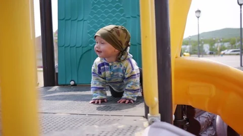 The child is on the playground. Stock Footage 90446900