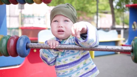The child is on the playground. Stock Footage 90446903