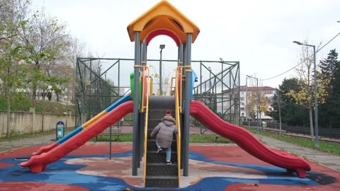 Child in playground Stock Footage 258962480