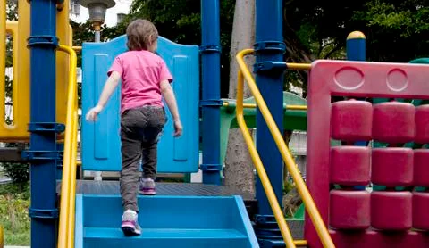 Child on the playground Stock Photos
