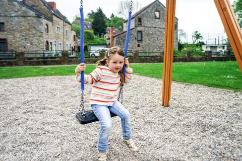 Child on a playground Stock Photos