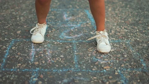 Child on playground play classics. School playground on asphalt. Children draw Video stock 165053315