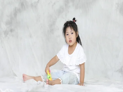 Child playing alone Stock Footage 77374581