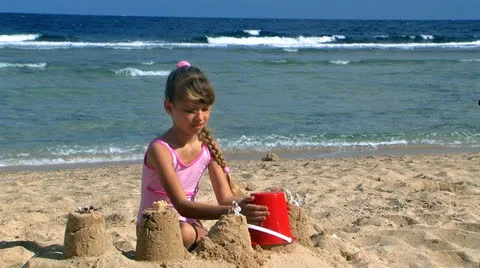 Child playing on beach. Stock Footage 24001089