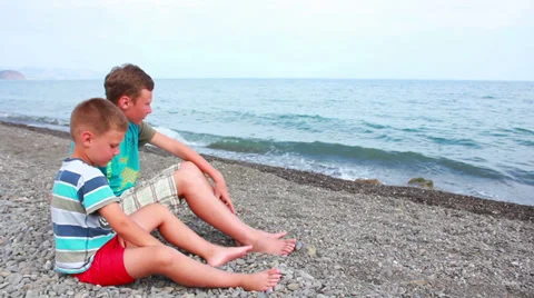 Child playing on beach Stock Footage 27265710