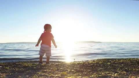 Child is playing on the beach. Stock Footage 64727318