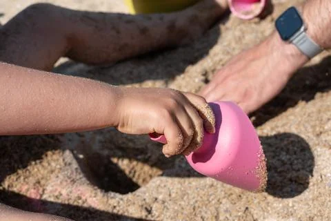 Child playing on a beach, good activity and sport for health and mental healt Fotos de archivo