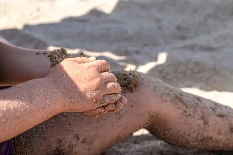 Child playing on a beach, good activity and sport for health and mental healt Fotos de archivo