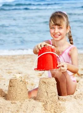 Child playing on  beach. Stock-Fotos