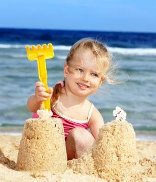 Child playing on  beach. Foto stock