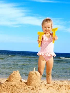 Child playing on  beach. Foto stock