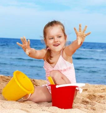 Child playing on  beach. Stock Photos