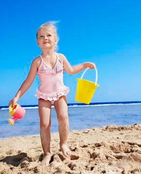 Child playing on  beach. Foto stock