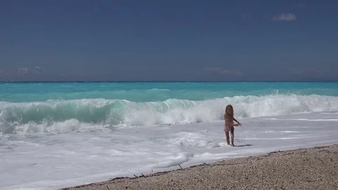 Child Playing on Beach, Sea Waves View, Girl Running on Coastline in Summer 4K Stock Footage