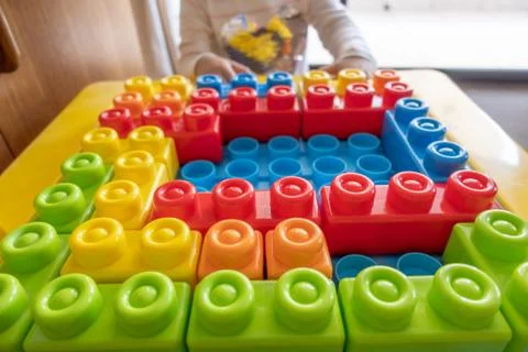 Child playing with block toys Stock Photos