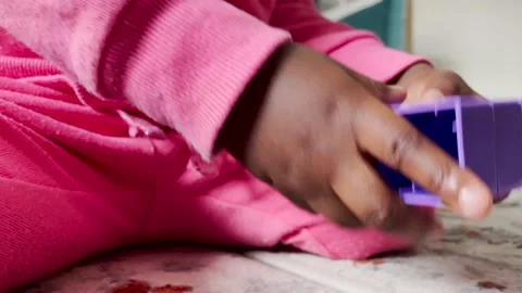 Child playing with bricks Stock Footage 154906452