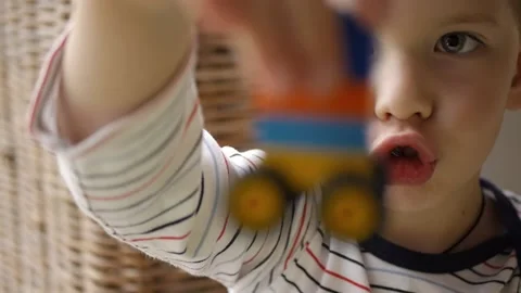 Child playing building blocks game Stock Footage 176429739