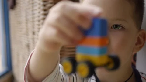 Child playing building blocks game Stock Footage 180131842