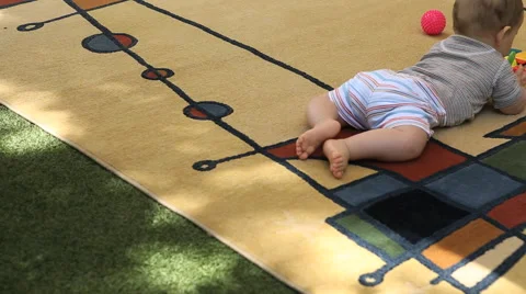 Child playing on carpet Stock Footage 41749848