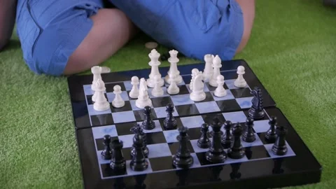 Child Playing Chess Stock Footage 141107065