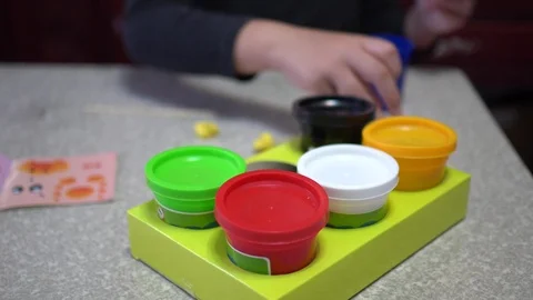 A child playing with clay. Stock Footage 99167550