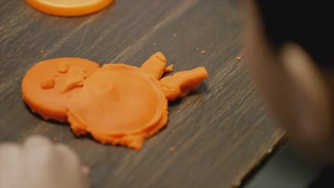 Child playing with clay Stock Footage 232870224