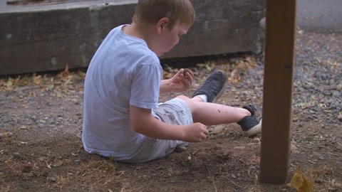 Child Playing in the Dirt Stock Footage 92689319