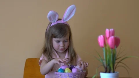 Child Playing With Easter Eggs Stock Footage 104992331