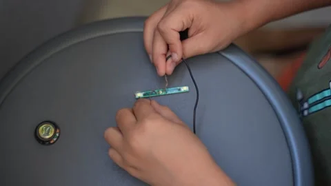 Child Playing With Electronic Circuit and LED Lights Stock Footage 346326608