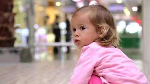 Child playing on the floor in the mall  Stock Footage 42304714
