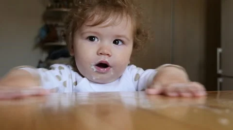 Child playing with flour Stock Footage 49949657