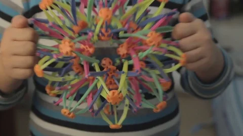 Child playing with a folding ball Stock Footage 79340520