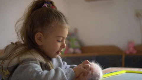 Child playing Video stock 131557594