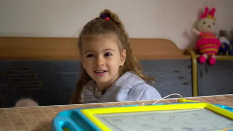 Child playing Video stock 131557779