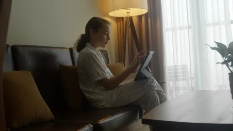 Child playing game on tablet, kid girl computer learning to wow excited and fun Stock Footage 307933050