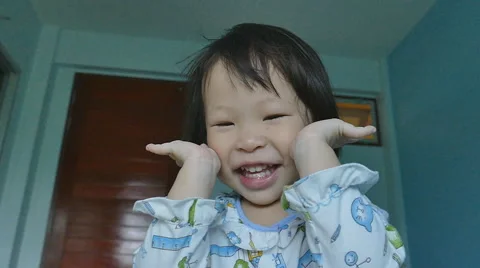 Child playing hide and seek  ,slow motion Stock Footage 52877774