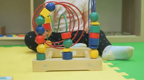 Child playing intellectual game on the floor Video stock 60769026