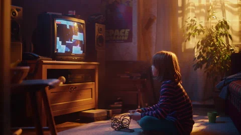 Child Playing Nostalgic Arcade Game at Home Stock Footage 197430278