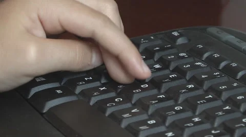 Child playing or working on a computer keyboard Stock-Footage 40242847