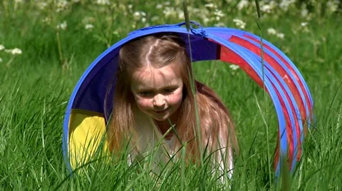 Child playing outdoors Stock Footage 22637556